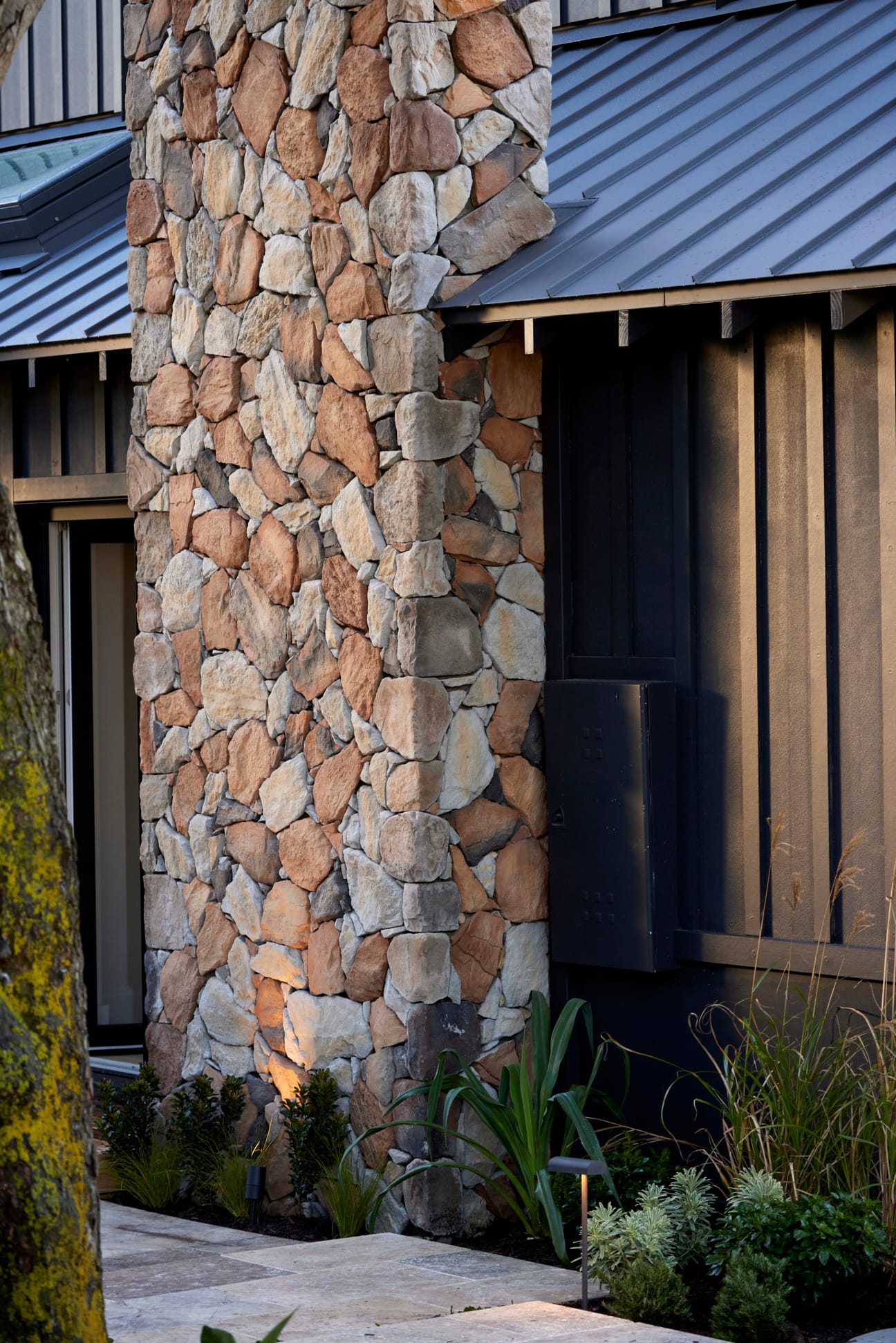 Stone chimney on The Block, using Natural Fieldstone in Gilded Sand.